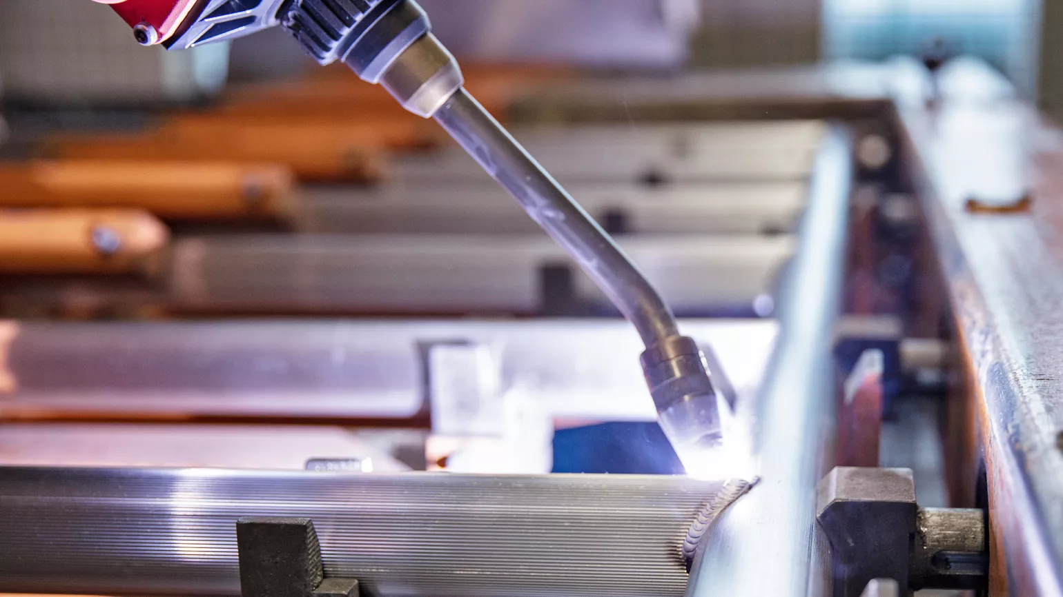 A pipe is welded.