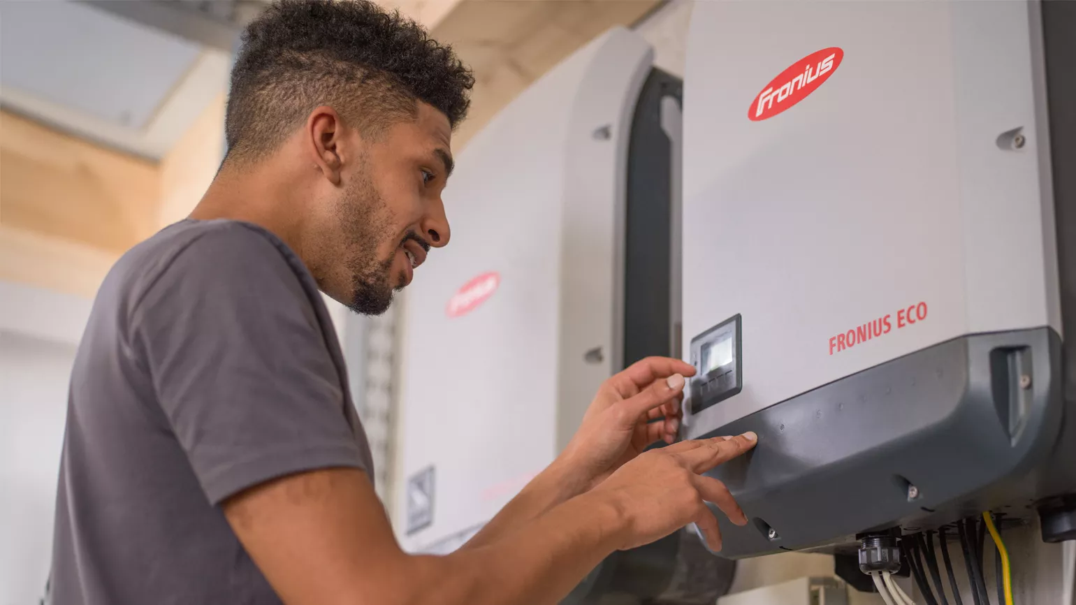 Installer checking settings on inverter