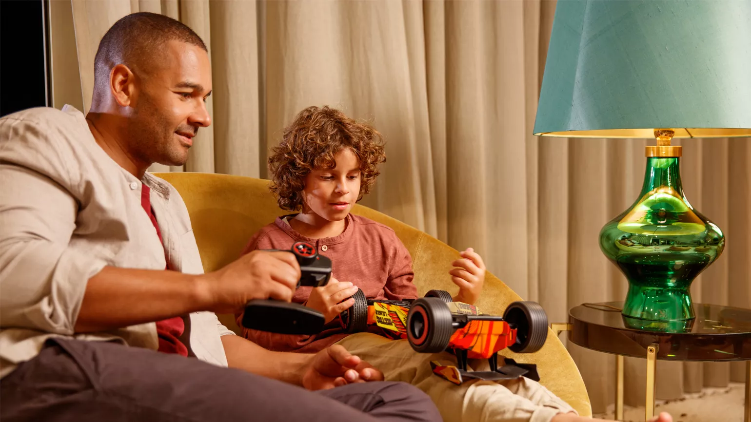 Father and son in living room